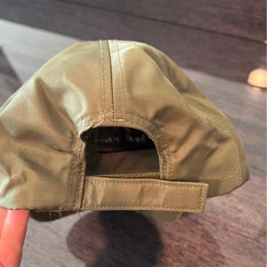 Army green “bad hair day” hat. In great condition